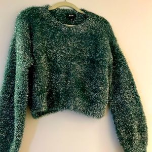 This stunning celebration sweater has delvered everywhere worn.